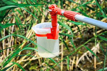 Image showing Take samples of water for laboratory testing. The concept - anal