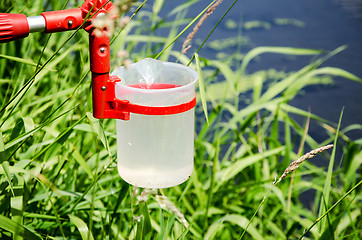 Image showing Take samples of water for laboratory testing. The concept - anal