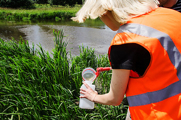 Image showing Take samples of water for laboratory testing. The concept - anal