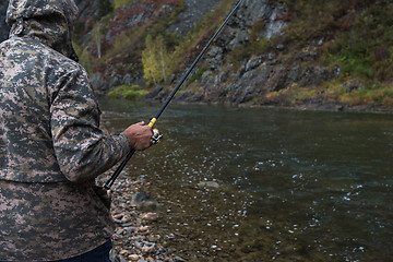 Image showing Fisherman at the Altai river