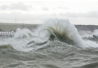 Image showing Curling Wave Spray at Newhaven Harbour