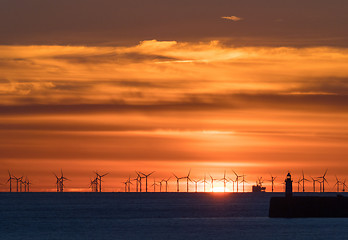 Image showing Rampion Windfarm and Newhaven Lighthouse at Sunset