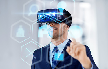 Image showing businessman with virtual reality headset at office