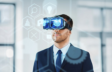 Image showing businessman with virtual reality headset at office