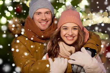 Image showing happy couple hugging at christmas tree