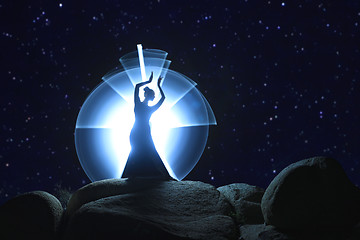 Image showing Unique Light Painted Imagery With Light Wand and Stars