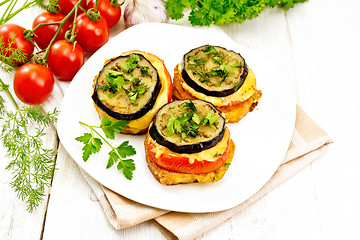 Image showing Appetizer of aubergines and cheese in plate on table