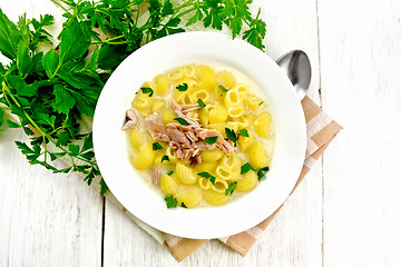 Image showing Soup creamy of chicken and pasta in plate on board top