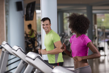 Image showing people exercisinng a cardio on treadmill