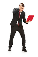 Image showing Full body portrait of businessman with laptop on white