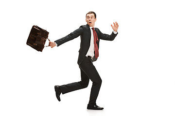 Image showing Funny cheerful businessman over white background