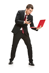 Image showing Full body portrait of businessman with laptop on white