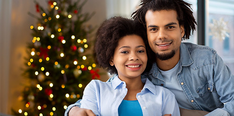 Image showing happy couple hugging on christmas