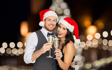 Image showing couple with champagne glasses at christmas party