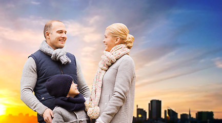 Image showing happy family over sunset in evening tallinn city