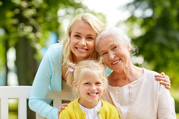 Image showing woman with daughter and senior mother at park