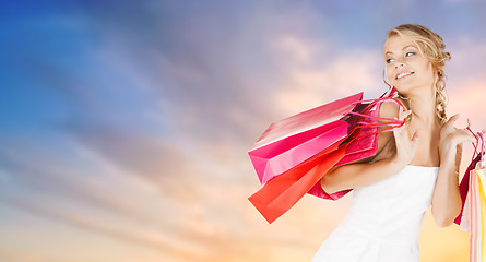 Image showing happy woman with shopping bags