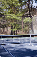 Image showing platform tennis paddle court  woods in suburban setting private 