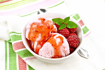 Image showing Ice cream crimson with syrup on light board