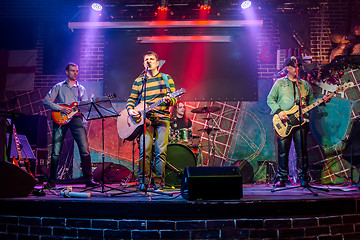 Image showing Band performs on stage in a nightclub