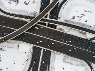 Image showing Aerial view of a freeway intersection Snow-covered in winter.