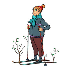 Image showing skier male in a forest of young trees