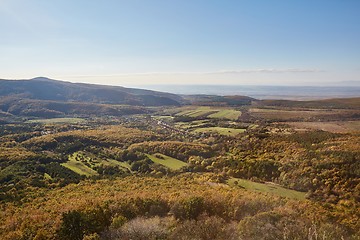 Image showing Hilly landscape with small village