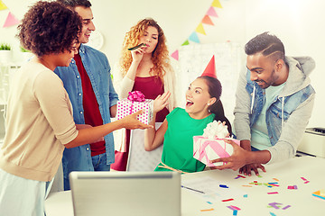 Image showing team greeting colleague at office birthday party