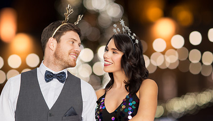 Image showing couple with christmas or new year party props