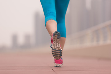 Image showing woman running on the promenade