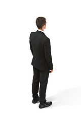 Image showing Back view of a businessman. Confident professional in suit