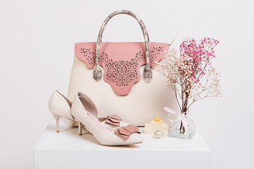 Image showing Female handbag, shoes and bouquet of dried flowers