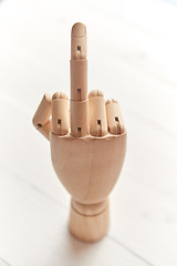 Image showing Wooden artificial hand is showing hidden message