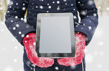 Image showing close up of woman with tablet pc in winter