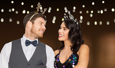 Image showing couple with christmas or new year party props