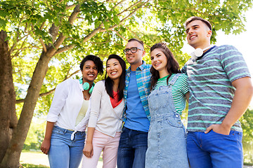 Image showing happy international friends in park