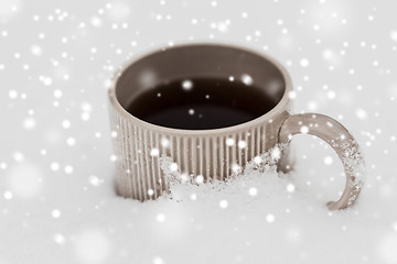 Image showing tea or coffee mug in snow
