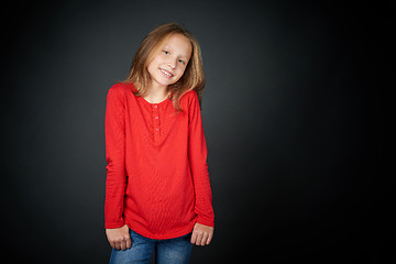 Image showing Little girl standing casually