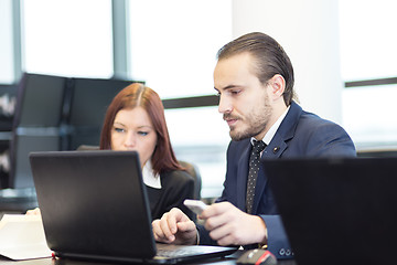 Image showing Business people in modern office.