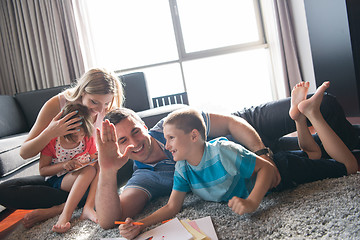 Image showing young couple spending time with kids