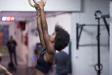 Image showing black woman doing dipping exercise