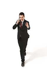 Image showing Funny cheerful businessman over white background