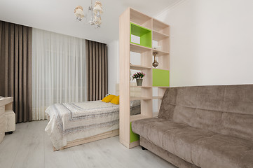 Image showing Bedroom interior with bookshelf