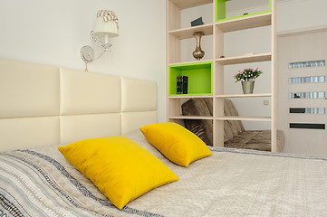 Image showing Bedroom interior with bookshelf