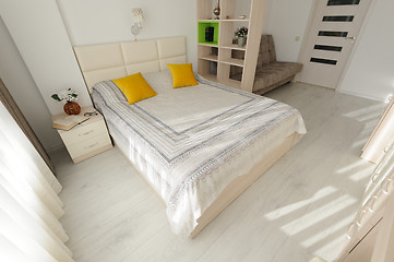 Image showing Bedroom interior with large double bed