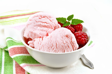 Image showing Ice cream crimson in bowl on light board