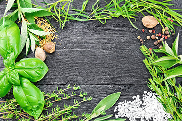 Image showing Frame from herbs and spices on black board