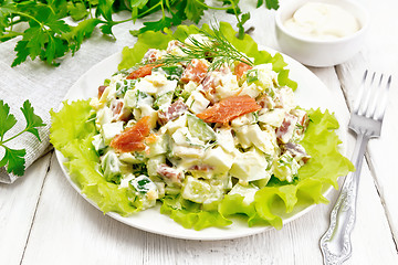 Image showing Salad of salmon and avocado with mayonnaise on white board