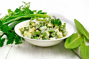 Image showing Salad with potatoes and sorrel on board