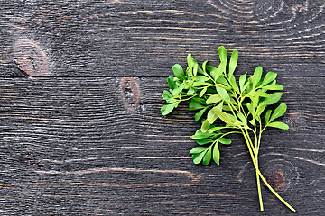 Image showing Rue leaves on black board